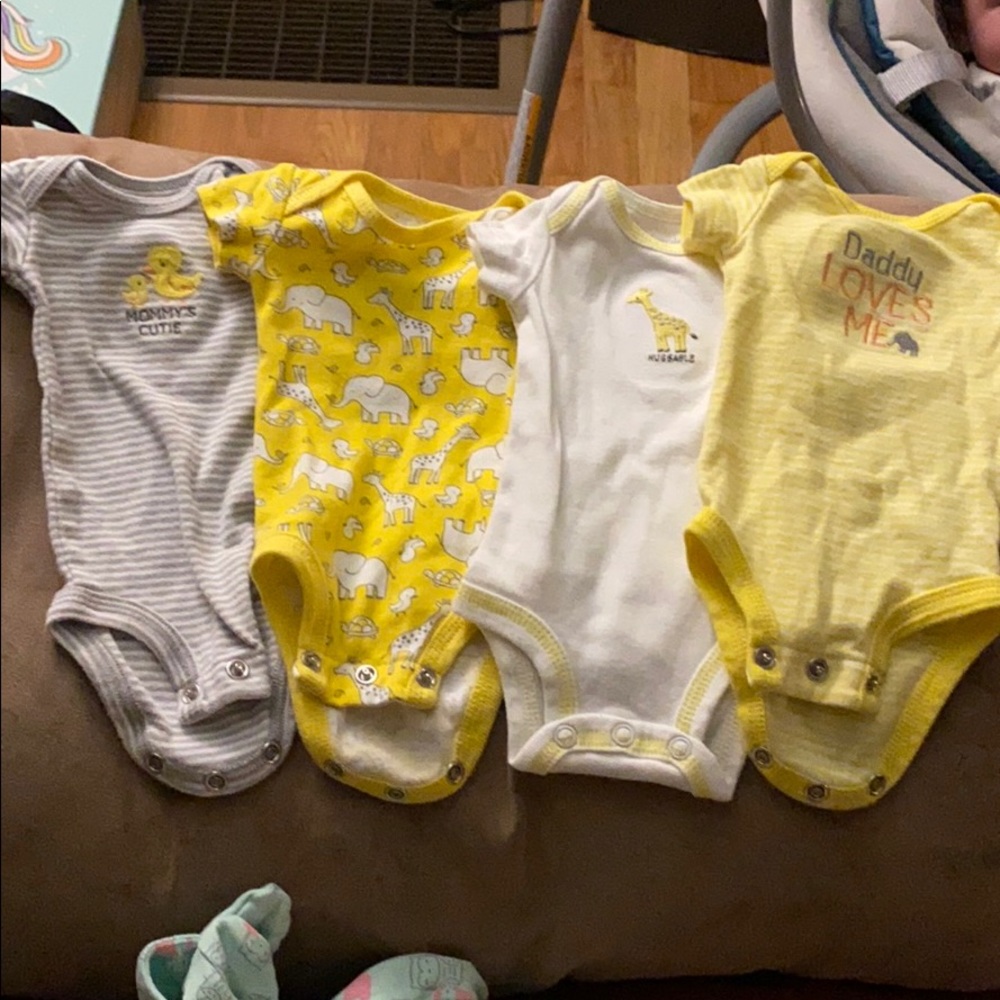 Carter’s preemie onesies. Set of 4